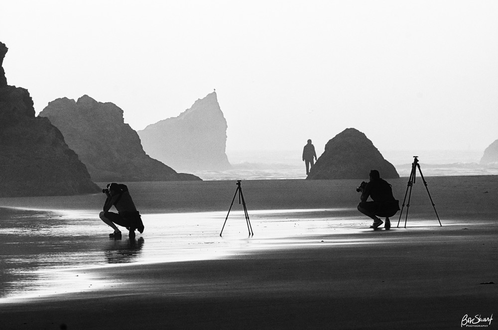 Photographers shooting sunset at Bandon Beach, Oregon